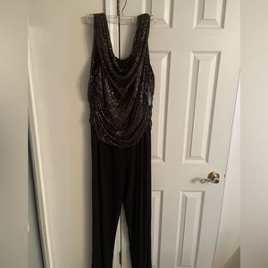 This beautiful R&K Richards jumpsuit will go fast so act now!!